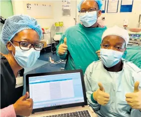  ?? ?? Heading the procedure were ENT head and neck surgeon Dr Lungi Setoaba (right) with chief audiologis­t Lindokuhle Zitha and medical officer Dr Koma