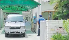  ?? PARDEEP PANDIT/HT ?? The owners coming out of the house they had rented out to power and irrigation minister Rana Gurjit Singh’s son at Defence Colony in Jalandhar on Wednesday.