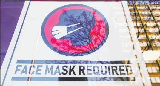  ?? Matt Rourke The Associated Press file ?? The Centers for Disease Control and Prevention on Friday will announce a change to the metrics it uses to determine whether to recommend face coverings. The new metrics will take into account hospitaliz­ations and local hospital capacity.