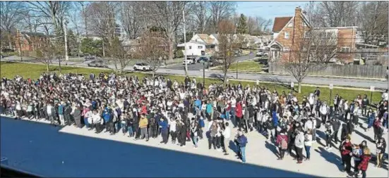  ?? SUBMITTED PHOTO ?? Students at Interboro High School gather outside the school Wednesday as they take part in the National School Walkout.