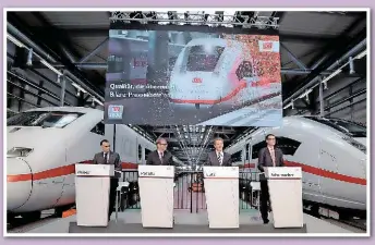 ?? DEUTSCHE BAHN. ?? Deutsche Bahn’s new chief executive Richard Lutz (centre right) was unveiled at a press conference in Berlin on March 23. Top of his in-tray will be dealing with DB’s rising debt, which could have implicatio­ns on the future scale of its operations in...