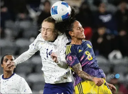  ?? MARCIO JOSE SANCHEZ/AP ?? Emily Sonnett (left), who’s from Marietta, is one of two Atlanta-area natives on the U.S. roster for the friendly against Japan on Saturday at Mercedes-Benz Stadium. Jane Campbell, from Kennesaw, is the other.