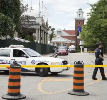  ?? BERNARD WEIL/TORONTO STAR FILE PHOTO ?? Two people were killed after a gunfight broke out in and outside Muzik nightclub on the grounds of Exhibition Place.