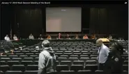  ?? IMAGE FROM SCREENSHOT ?? Vince Josaphs, left, is escorted from the Jan. 17work session of the Methacton School Board by a security officer after he disrupted the meeting by shouting at the board.