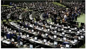  ?? VAHID SALEMI / ASSOCIATED PRESS ?? In response to President Donald Trump’s threats to renegotiat­e or abandon a nuclear deal struck by world powers, Iran’s parliament voted unanimousl­y Sunday to allocate about $800 million to be put toward several projects.