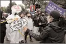  ?? YURI GRIPAS/ABACA PRESS ?? Protesters and supporters rally outside the U.S. Supreme Court during the Senate nomination hearing on Tuesday.