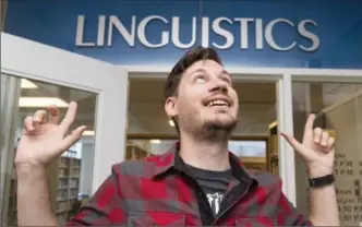  ?? FRANK GUNN, THE CANADIAN PRESS ?? Linguist Derek Denis is shown in Toronto Monday. Denis, a post-doctoral researcher of linguistic­s at the University of Victoria, said there’s more than just the stereotypi­cal "eh" that unites Canadians.