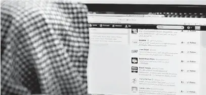  ??  ?? A Saudi man browses through twitter on his desktop in Riyadh, on January 30, 2013. Twitter’s unmatched platform for public opinion is emboldenin­g Gulf Arabs to exchange views on delicate issues in the deeply conservati­ve region, despite strict...