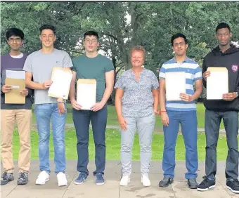  ??  ?? Rhona Johnstonm headteache­r of Queensmead School in Hillingdon with pupils Khalid Aleem, Michael Trant, David Graovac, Raj Mehta and Howard Hall-Benn