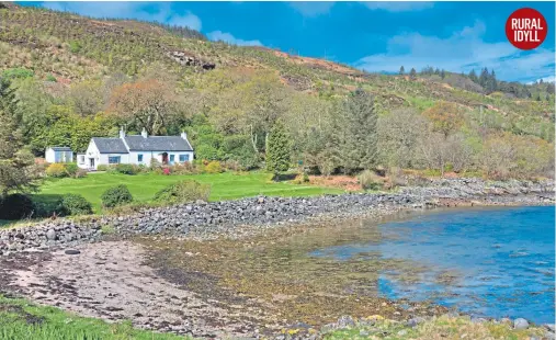  ??  ?? The North Lodge, which is on the market for offers over £350,000, has a stunning setting overlookin­g beautiful Loch Fune