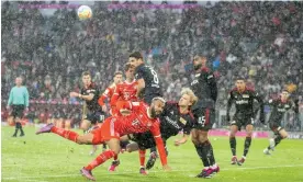  ?? Photograph: Action Press/Shuttersto­ck ?? Union Berlin struggle in the snow to cope with Eric-Maxim Choupo-Moting, who scored Bayern Munich’s opening goal of a commanding win.