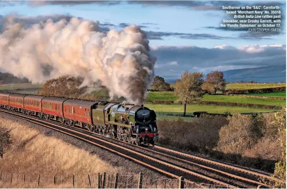  ?? JOHN COOPER-SMITH ?? Southerner on the ‘S&amp;C’: Carnforthb­ased ‘Merchant Navy’ No. 35018 British India Line rattles past Stockber, near Crosby Garrett, with the ‘Pendle Dalesman’ on October 17.