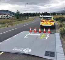  ??  ?? Officers educated motorists about safe driving around cyclists.