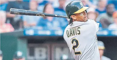  ?? JOHN SLEEZER/KANSAS CITY STAR/TNS ?? Oakland designated hitter Khris Davis is the highest-paid player on the A’s, making $8 million. Oakland is challengin­g for a wild-card spot despite a team payroll of just $66 million.