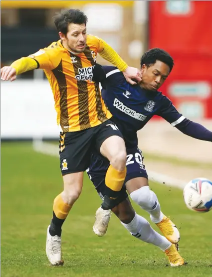  ?? PICTURE: PA Images ?? DUEL: Cambridge’s Wes Hoolahan and Southend’s Ashley Nathaniel-George battle for the ball