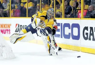  ?? BRUCE BENNETT/GETTY IMAGE ?? Nashville Predator’ goaltender Pekka Rinne passes the puck during the second period against the Anaheim Ducks in Game 4 of the Western Conference Final during the Stanley Cup Playoffs at Bridgeston­e Arena, in Nashville, Tenn.