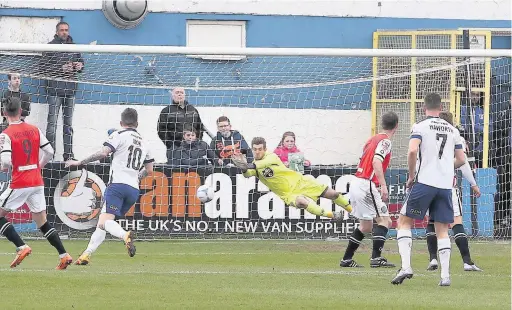  ?? Peter Hilton Photograph­y ?? ●● Action from Macclesfie­ld’s game at Barrow at the weekend