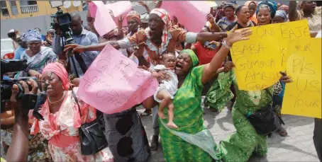  ?? Dan Ukana ?? Traders of Olorunsogo Market, Oshodi, protesting the threat by the Lagos State Government to demolish their market in Lagos...yesterday.