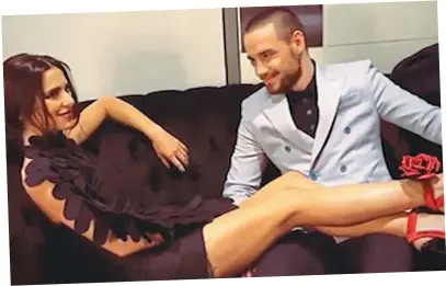  ??  ?? He’s mine: Cheryl rests her legs on Liam’s lap in a backstage clip he shared on social media