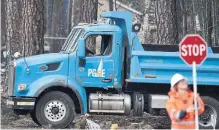  ?? JOSH EDELSON AFP/GETTY IMAGES ?? PG&amp;E’s stock lost nearly 70 per cent of market value since early November as investors worried about potential liabilitie­s for the role the firm’s equipment may have played in multiple wildfires.