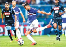  ??  ?? Sampdoria’s Gregoire Defrel scoring against Napoli yesterday Photo: AP