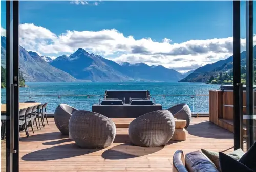  ??  ?? Above: Views of Lake Wakatipu from the terrace of the penthouse at Eichardt’s Private Hotel. Opposite, from
top: Inside The Den of Antiquity; a smorgasbor­d of delights at Bazaar Marketplac­e.