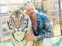  ?? NETFLIX TRIBUNE NEWS SERVICE FILE PHOTO ?? Going as Joe Exotic from Netflix’s “Tiger King?” Grab a friend from your social bubble to dress as a tiger to complete the look.