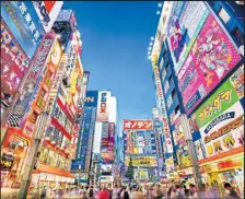 ?? [iStock/Shuttersto­ck] ?? Tokyo, die pulsierend­e Hauptstadt Japans, beeindruck­t mit futuristis­cher Architektu­r, quirligen Stadtviert­eln und erstklassi­ger Küche (links). Der Nishiki-Markt wird von den Einheimisc­hen liebevoll „Kyotos Küche“genannt und versorgt die Stadt seit 400 Jahren (rechts).