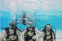  ?? SHAUGHN BUTTS ?? Edmonton’s CottonTail Corners naturist group holds a nude scuba class. The organizers have experience­d no backlash.