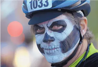  ?? GREG SORBER/JOURNAL ?? Warren Kelm of Los Ranchos de Albuquerqu­e sports spooky makeup at last year’s Day of the Tread cycling event. This year’s festivitie­s take place Sunday.