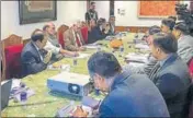  ??  ?? Home minister Rajnath Singh chairs a review meeting in Srinagar on Thursday. Jammu and Kashmir governor NN Vohra and national security advisor Ajit Doval could also be seen. MHA PHOTO VIA PIB