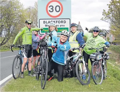  ??  ?? Cyclists take to the streets of Blackford to highlight the path network drop-in meeting and survey.