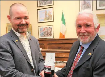  ??  ?? Ronan Gilroy presents Eddie O’ Gorman, Spanish Armada Developmen­t Associatio­n with a cheque for €3400. Proceeds were raised by Benbulben Motor Show which is held annually in Gilroys Yard, Grange, Sligo. Pic Charlie Brady Photograph­y.