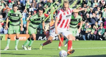  ?? Pictures: Antony Thompson - Thousand Word Media ?? Luke Varney takes a penalty against Forest Green. Above, Michael Duff