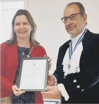  ?? ?? Clare Elkington, chair of trustees at PACSO, with High Sheriff Neil Hart