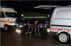  ?? FOTO: KENNETH MEYER ?? Liget af Louise Borglit rulles her ind i en ambulance den aften, den 32- årige kvinde blev dræbt.