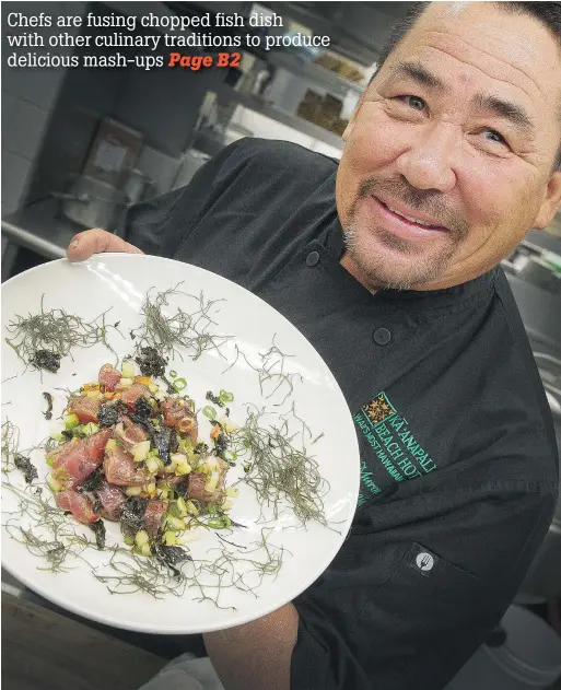  ??  ?? Chef Tom Muromoto of Ka’anapali Beach Hotel in Maui makes poke, a chopped sushi salad, at Listel Hotel.