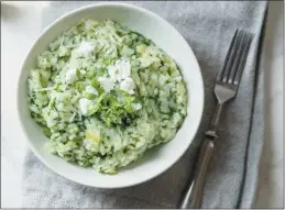  ?? GETTY IMAGES ?? Risotto gets a flavorful twist with the addition of fresh spinach and Gouda.