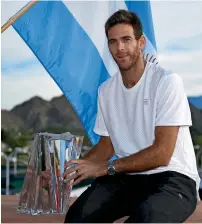  ?? — AP ?? Juan Martin del Potro poses with his trophy.