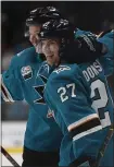  ?? NHAT V. MEYER — STAFF PHOTOGRAPH­ER ?? The Sharks’ Joonas Donskoi (27) celebrates his goal with Tomas Hertl during Tuesday night’s thrashing of the Edmonton Oilers.