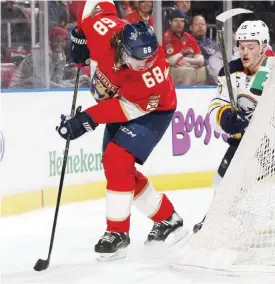  ??  ?? SUNRISE: Buffalo Sabres center Jack Eichel (15) defends against Florida Panthers right wing Jaromir Jagr (68) during the first period of an NHL hockey game, Tuesday, in Sunrise, Fla. —AP