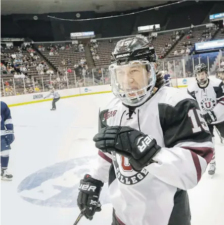  ?? JOHN MINCHILLO/THE CANADIAN PRESS/FILES ?? Union College’s Spencer Foo celebrates a goal during NCAA playoff action. Foo, who amassed 62 points this last season for the NCAA Division 1 team, is considered a prized prospect with the Calgary Flames after signing a free-agent contract.