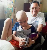  ??  ?? Touching hearts: Leong with a 13-year-old bone cancer patient who passed away from the illness last year.