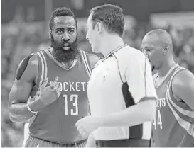  ?? Rich Pedroncell­i / Associated Press ?? Rockets guard James Harden (13) just wants to make sure as he questions official Marat Kogut about a foul call in the first quarter of Friday’s game. Otherwise, it was a great night for Harden, who finished with 43 points and 13 assists.