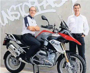  ??  ?? BMW Group Thailand president Matthias Pfalz (right) and Markus Glaeser, head of BMW Motorrad Thailand, show off the BMW F800GS motorbike, which is made in Rayong.