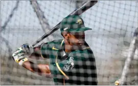  ?? RANDY VAZQUEZ — STAFF PHOTOGRAPH­ER ?? The Athletics’ Khris Davis, shown at spring training Thursday, was mired in self-doubt last season but is now confident he can return to the top of his game.