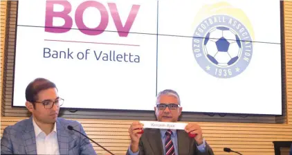  ??  ?? Charles Azzopardi, Executive PR & Marketing at Bank of Valletta (centre) and Dr Samuel Azzopardi, President of the Gozo Football Associatio­n, left during yesterday’s draws Photo: Stefan Abela (Bank of Valletta)