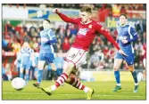  ??  ?? HE’S A FAST STARTER: Ben Tollitt scores Wrexham’s fourth goal against Salford City on Boxing Day