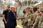  ?? ERIC GAY/ASSOCIATED PRESS ?? Former President Donald Trump greets members of the National Guard on the United States-Mexico border during a campaignin­g visit to Eagle Pass, Texas, on Feb. 29..