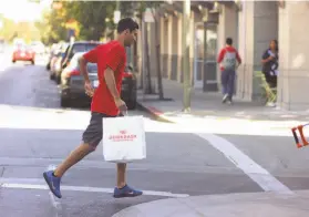  ?? DoorDash ?? San Franciscob­ased fooddelive­ry service DoorDash requires workers to resolve disputes with the company by arbitratio­n rather than the legal system.